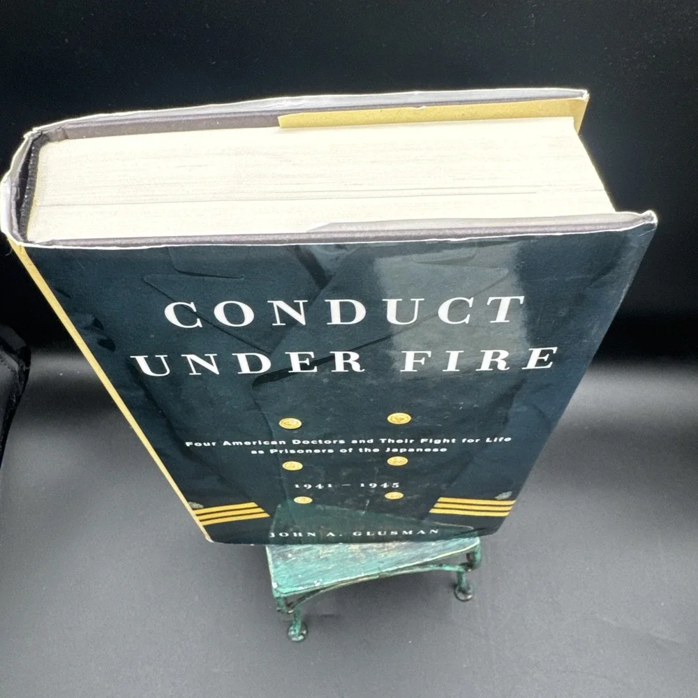 Conduct Under Fire   John A Glusman     2005 Edition HB DJ